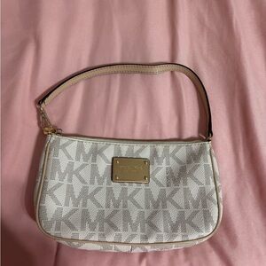 Michael Kors Cream and Tan Monogram Wristlet